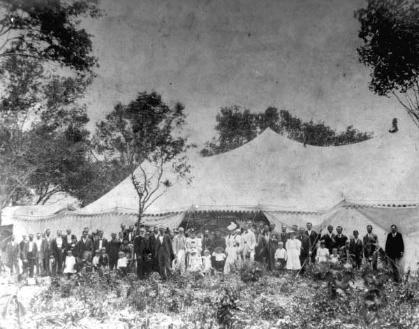 People gathered outside "Camp Meeting" tent - Miami, Florida