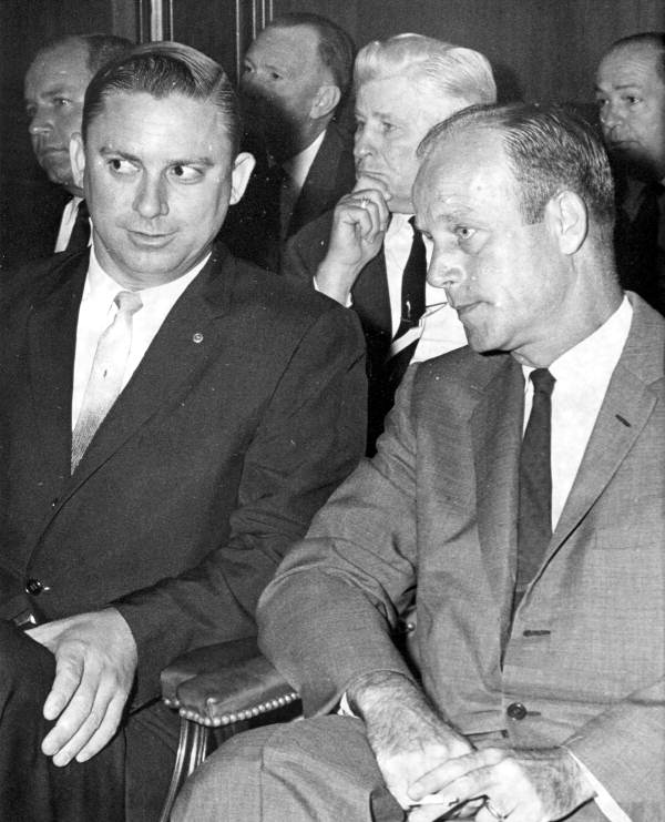 Men listening to Florida cabinet confirm Louie Wainwright as Director of the Division of Corrections : Tallahassee, Florida.