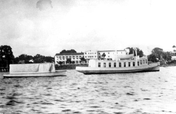 Ferries "Alma May" and "Nettie" moored at a dock on Lake Monroe - Enterprise, Florida