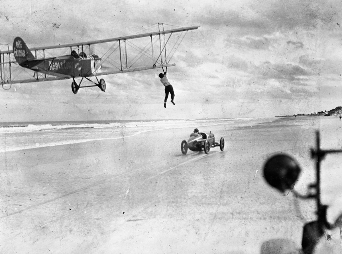 Auto-to-airplane transfer stunt - Daytona Beach, Florida