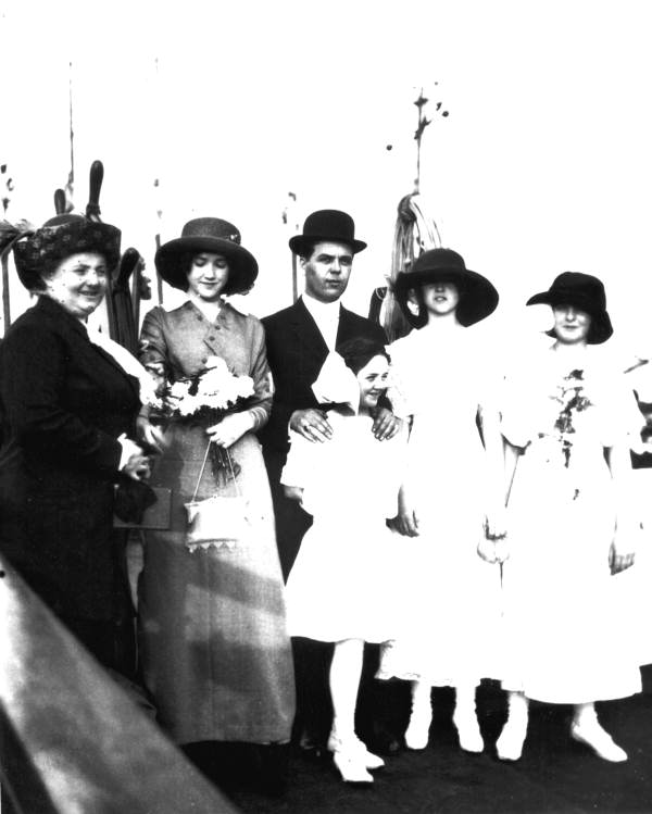 Unidentified family aboard ship