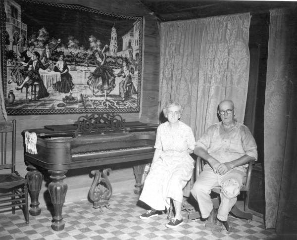 Kathleen and Archibald Nicholson at home by their piano - Gadsden County, Florida
