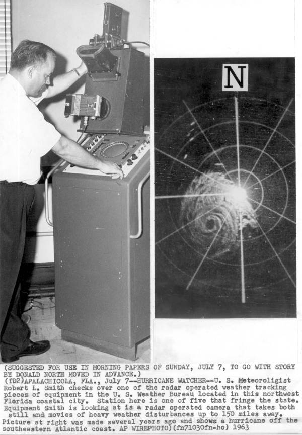 Meteorologist with radar operated equipment - Apalachicola, Florida.
