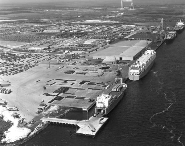 Aerial view of goods being unloaded at port - Jacksonville, Florida.