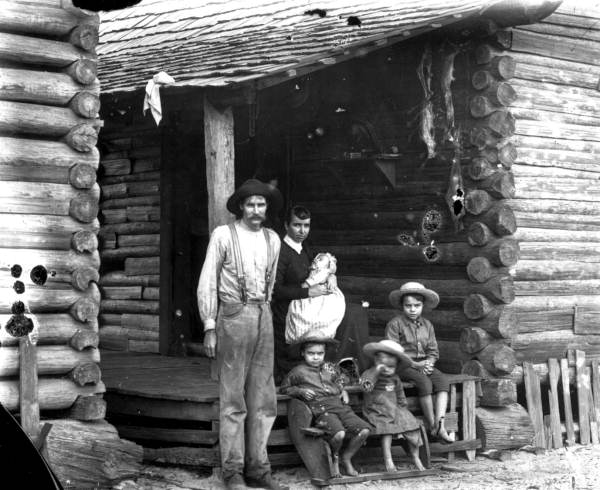 Brown family on the steps of their home - Lake County, Florida