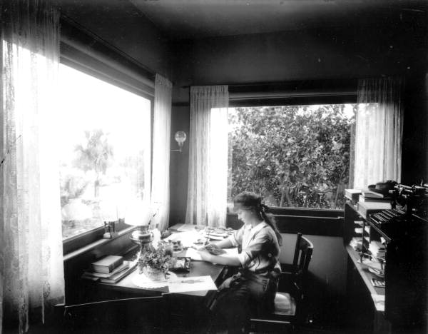 Edna Pearsall sitting in a writing room - Melrose, Florida