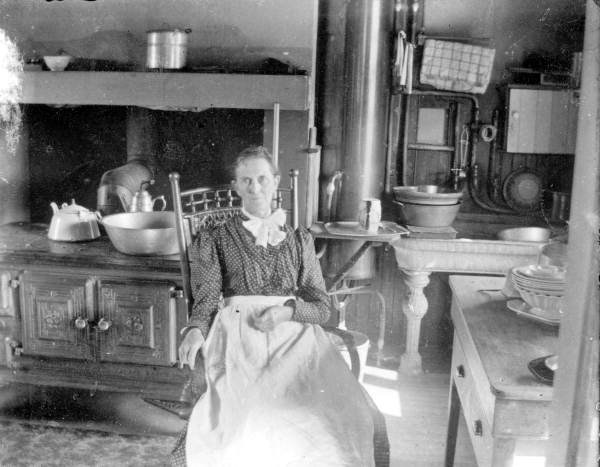 Unidentified woman in her kitchen - Melrose, Florida