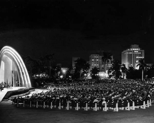 People at the bandshell in Bayfront Park enjoying an evening concert - Miami, Florida.