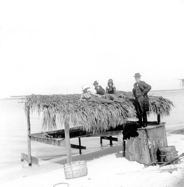 DesMones crowd and fishing shack - Shell Island, Florida