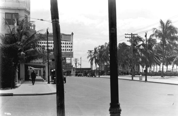 Looking down East Flagler Street between 2 poles - Miami, Florida.