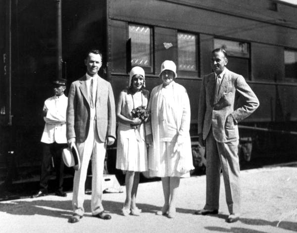 Motion picture actress Lupe Vélez with some friends at the depot - Tampa, Florida.