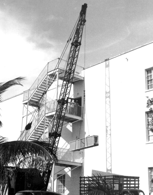 Southern Bell Telephone and Telegraph Company equipment being unloaded - Hollywood, Florida