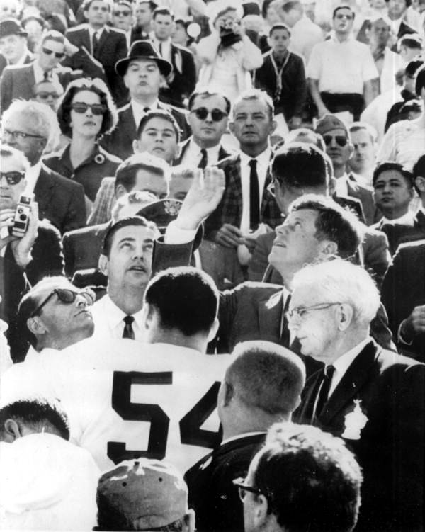 President John F. Kennedy tossing coin to start the Orange Bowl - Miami, Florida