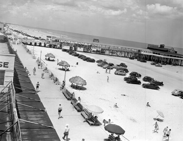 View looking over section of Jacksonville Beach with pier.
