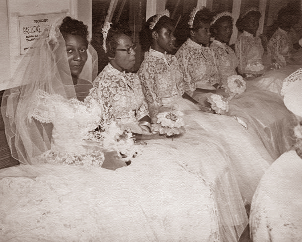 Delores McCoy with bridesmaids on her wedding day.