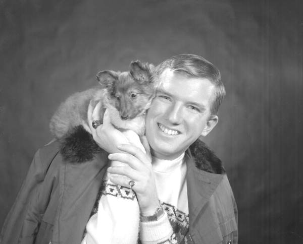 Portrait of Tom Sisco with puppy - Tallahassee, Florida.