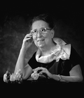 Portrait of Miss Ruby Pearl Diamond with snuff bottle collection - Tallahassee, Florida.