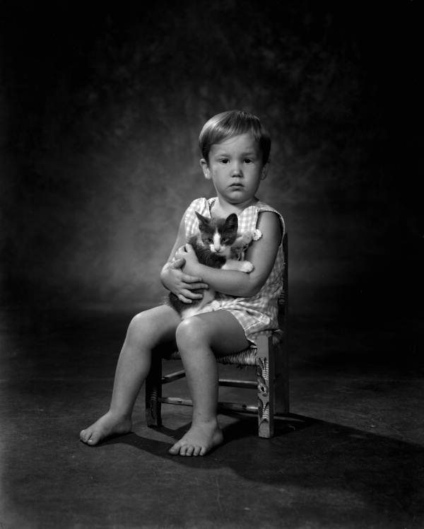 Portrait of John Curry with a kitten - Tallahassee, Florida.