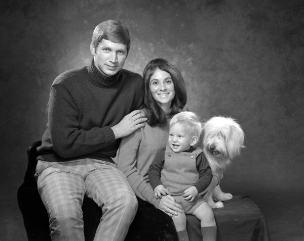 Portrait of Robert, Kathy and Chris Graham with their dog Daisy - Tallahassee, Florida.