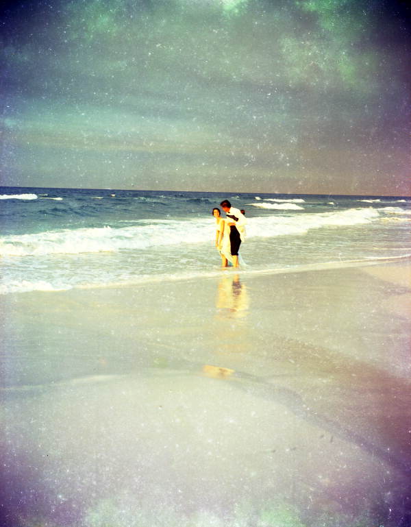 Couple in formal wear on a beach in Florida.