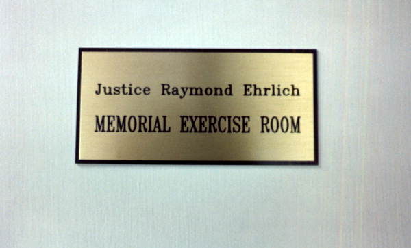 Plaque at the Justice Raymond Ehrlich Memorial Exercise Room in the Florida Supreme Court Building - Tallahassee, Florida.