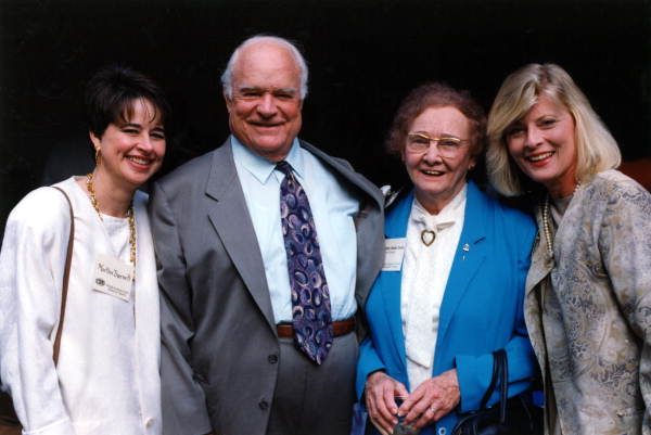 People gathered with Eleventh Circuit Court judge Mattie Belle Davis for a group portrait during the reception in the courtyard of the U.S. Courthouse - Miami, Florida.