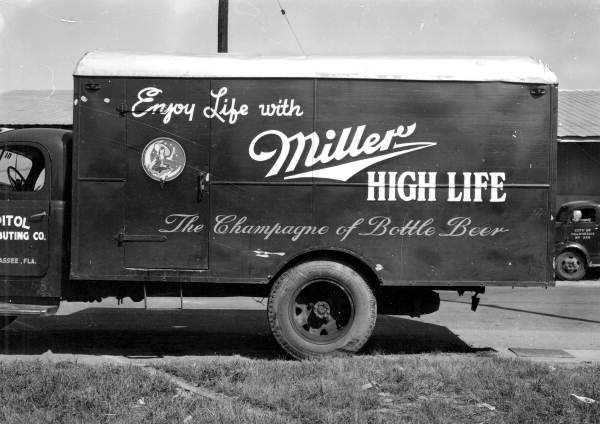 Truck will Miller Beer advertising
