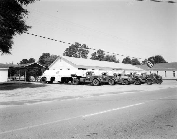 Trucks that belong to the Bay Petroleum Corporation