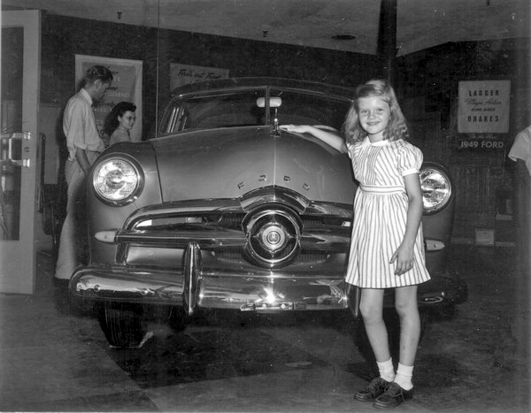 Shellie Frances Slade poses with a car - Tallahassee, Florida