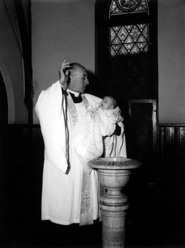 Parson Alfriend baptises the Parker baby- Tallahassee, Florida