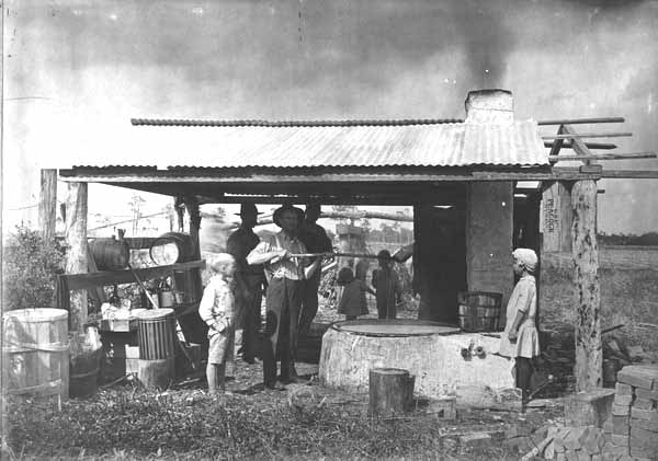 The boiling of cane syrup