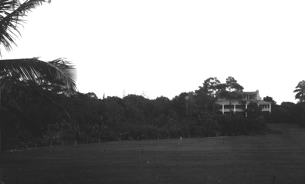Lawn and house facing bay