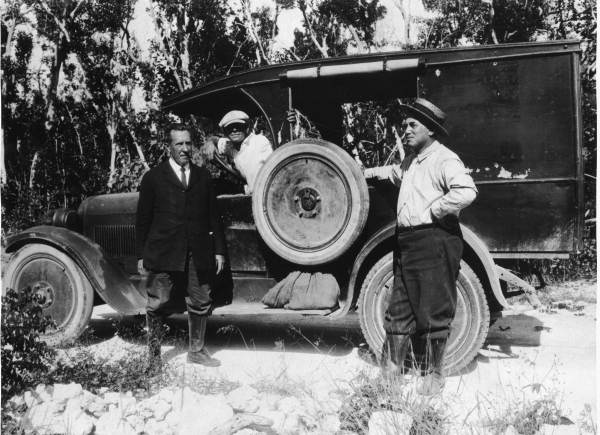 Dr. John K. Small, John DeWinkler in truck, and Charles A. Mosier
