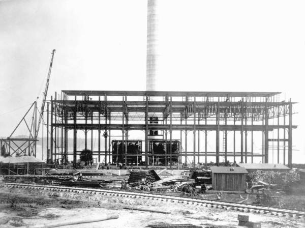 Old industrial building with a smokestack.