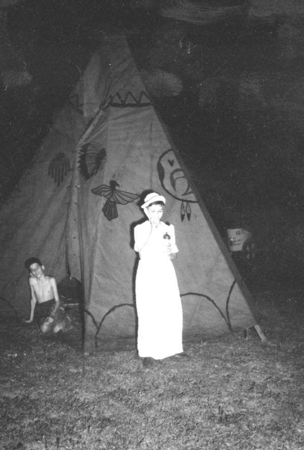 Boy scout dressed as baby?.