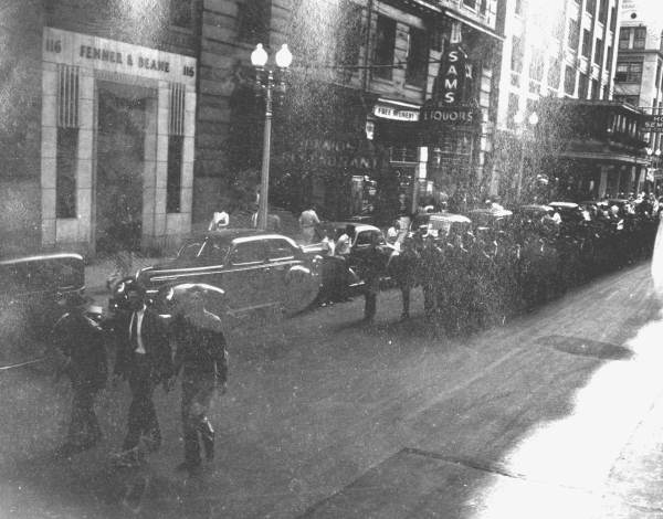 Boy Scouts in a parade.