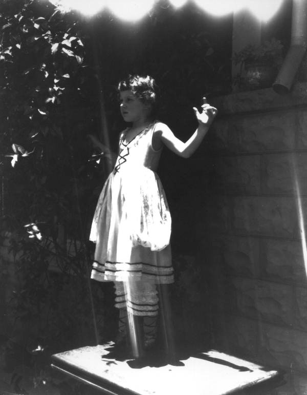 Girl in ballet slippers.