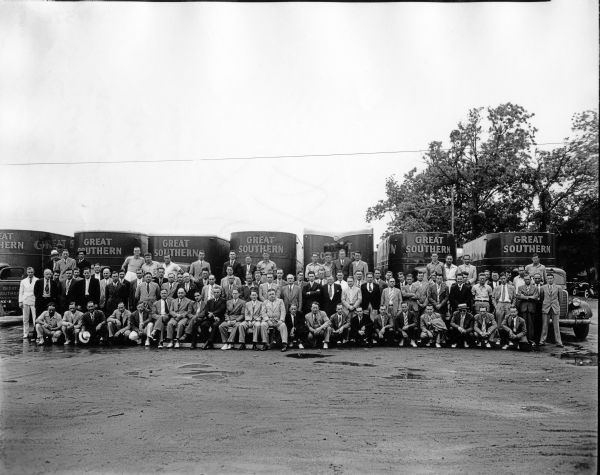 Men and refrigerated trucks from Great Southern Trucking Company.