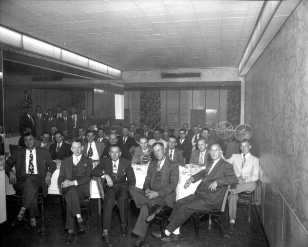 Men at luncheon.