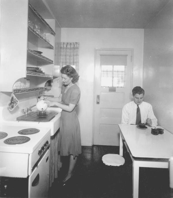 Couple in kitchen.