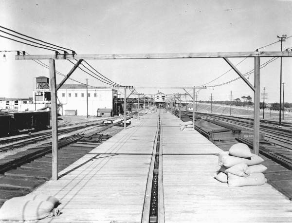 Train cars at ice company.