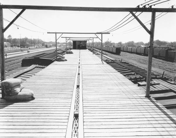 Train cars at ice company.