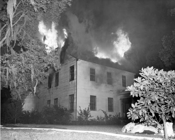 View showing a house on fire.
