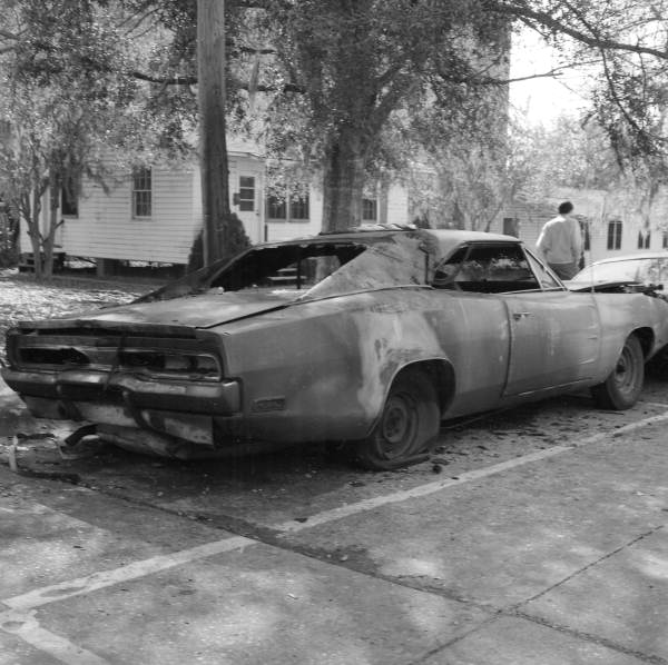 View showing a car destroyed by arson at FSU in Tallahassee, Florida.