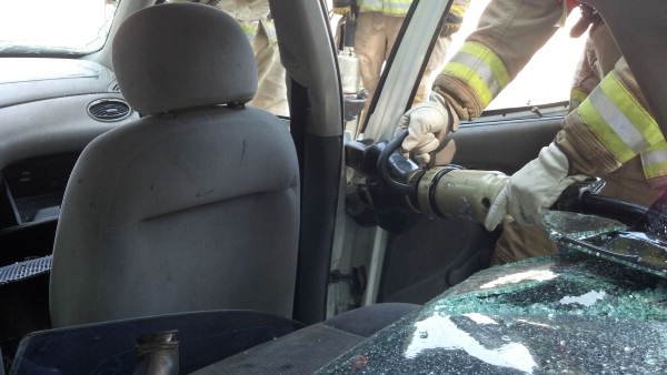 Door pins on B post being cut during vehicle extrication training by TFD members at the Pick-n-Pull salvage yard on Woodville Highway in Tallahassee, Florida.