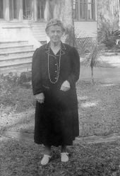 Portrait of Lillian Bates in front of the Altamonte Hotel in Altamonte Springs.