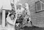 Sarah McKee posing with her son Mick at McKee's Museum of Sunken Treasure - Plantation Key, Florida