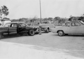 Unidentified men changing a tire