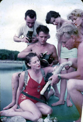 Art McKee showing group the coral encrusted pistol he found - Plantation Key, Florida.