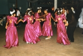 Bridesmaids dancing during wedding ceremony at the Sacred Heart Catholic Church in Okeechobee.